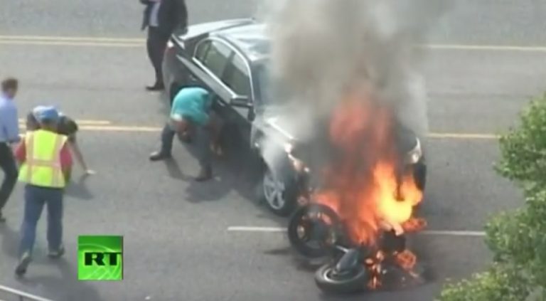 Motorcyclist Trapped Under a Fiery Car Heroically Saved By Bystanders