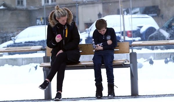 Responses Of Strangers Noticing Boy Shivering Outside Captured On Camera