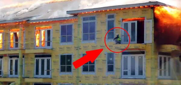 Firefighters Save Man Trapped On Ledge of Building Engulfed In Flames