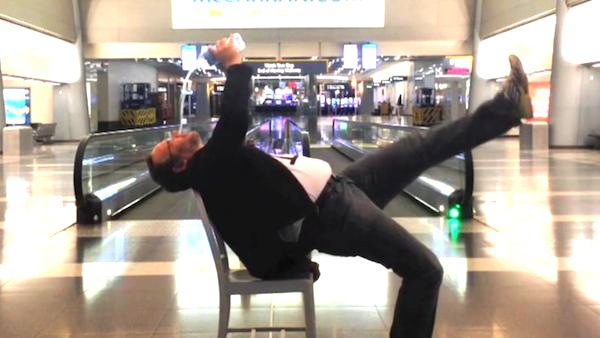 Man makes video at airport with his iphone
