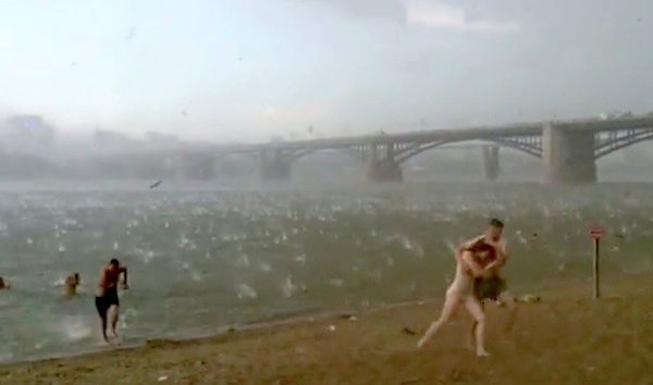 Beachgoers interrupted by hail storm