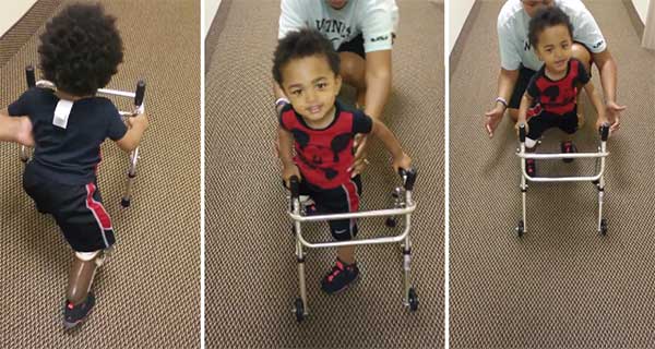 Boy taking first steps