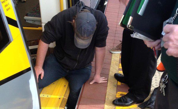Man stuck at commuter train