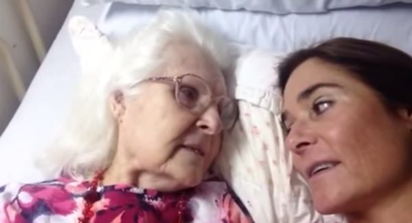 mother and daughter touching moment