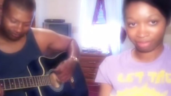 dad and daughter sing rooster