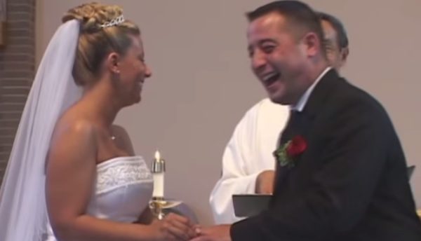 laughing bride and groom