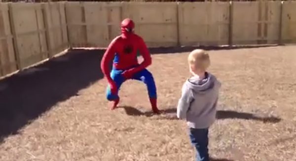 dad surprises son as spiderman