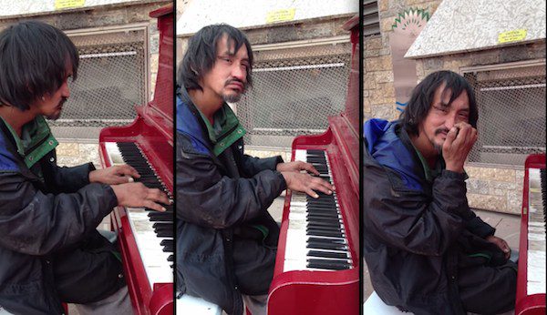 homeless man plays piano