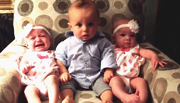 baby surprised by twins