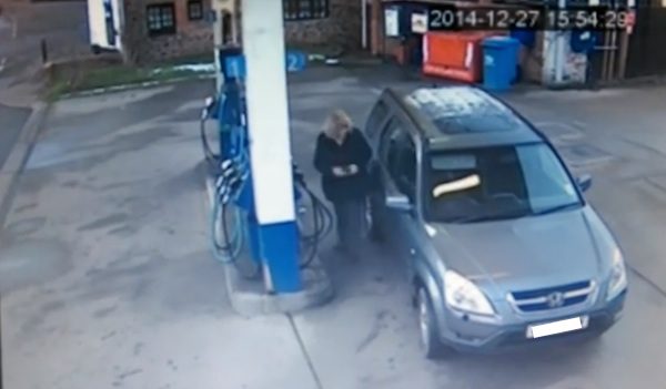car at gas station