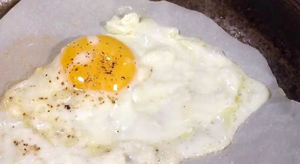 frying egg with parchment paper
