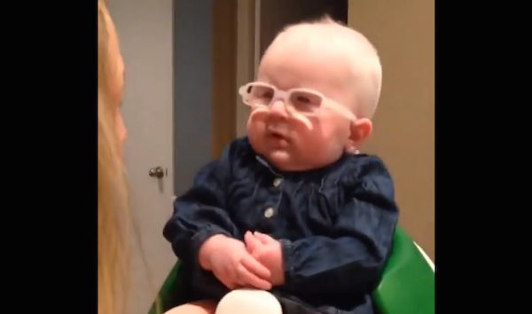 baby with albinism gets glasses to see