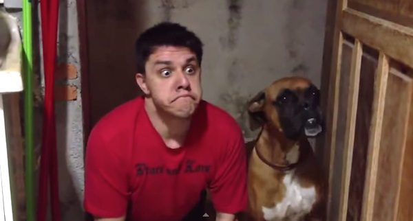 man imitates dog