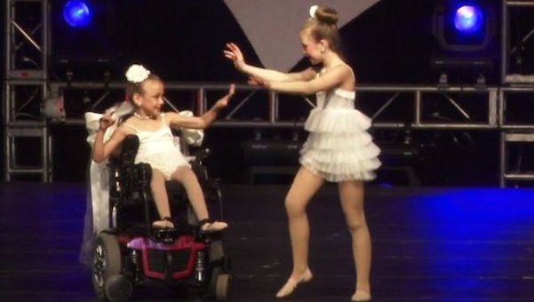 sisters dance in wheelchairs