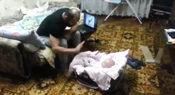 cat defends baby