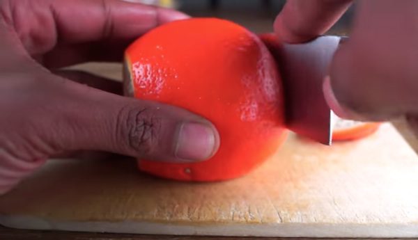 cutting an orange