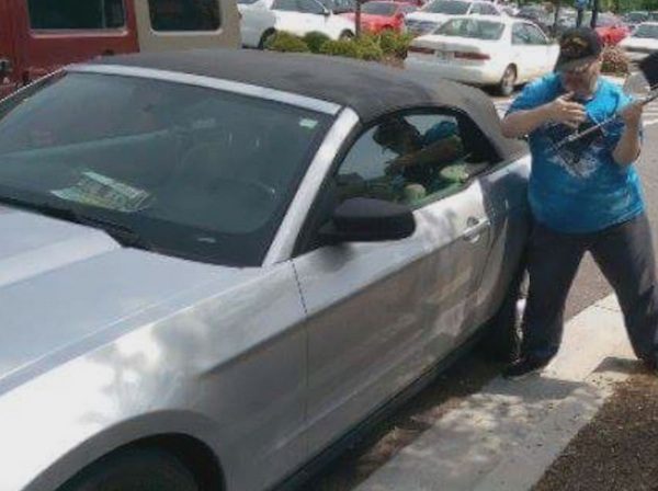 man-smashes-window