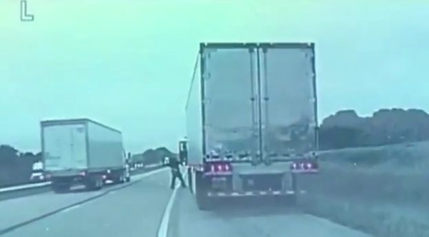 state trooper helps semitruck driver
