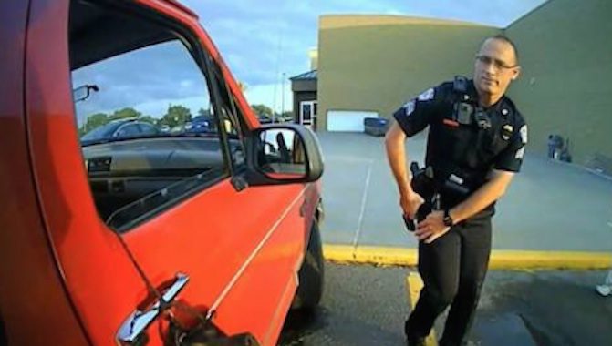 Police See A Dog Hanging Outside Of Truck And Save His Life