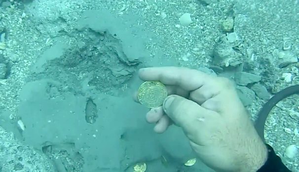 diver finds treasure