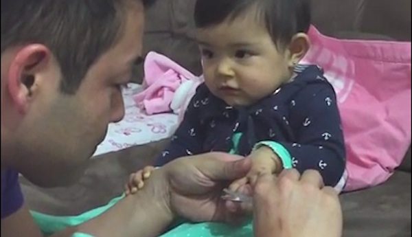 baby gets her nails done