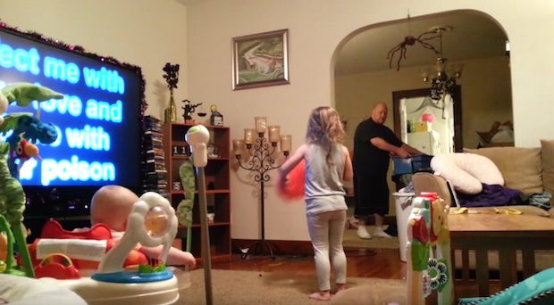 dad watches kids