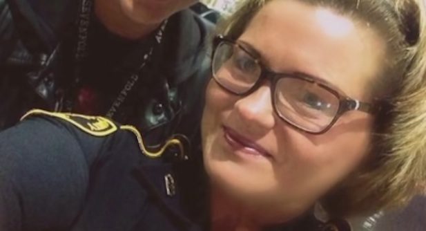 Kind-Hearted Teen Stands Guard For Police Officer While She Pumps Gas