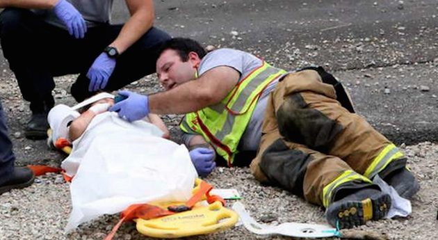 Firefighter Comforts Injured Boy With “Happy Feet” After Car Crash