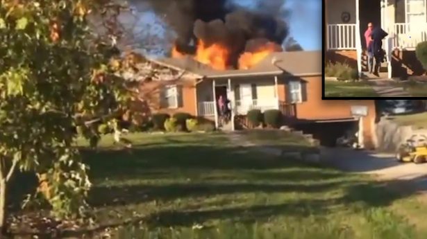 man rescues dog from fire