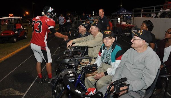 football player with vets
