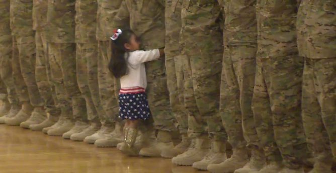 girl hugs dad