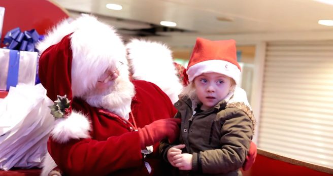 Santa Signs To Little Girl Who Could Not Hear Him