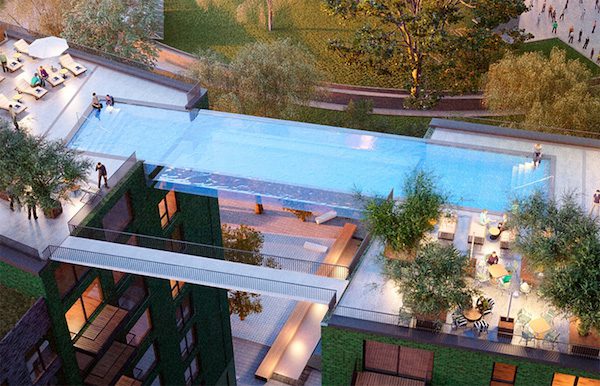 Rooftop Glass Bottomed Sky Pool Lets You Swim Suspended Between Buildings