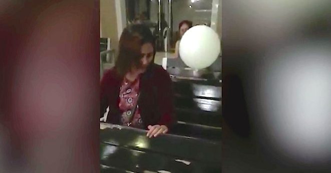 Floating White Balloon Comforts Grieving Mother At Her Son’s Funeral