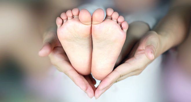 How To Soothe A Fussy Baby By Gently Massaging Their Feet