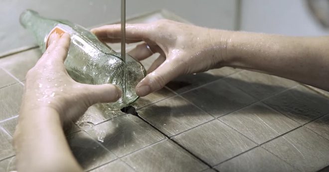 Artist Takes Glass Coca-Cola Bottles And Makes Gorgeous Chandeliers