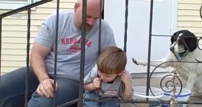 Dad Tries To Free His Mischievous Boy After He Gets His Head Stuck In A Fence