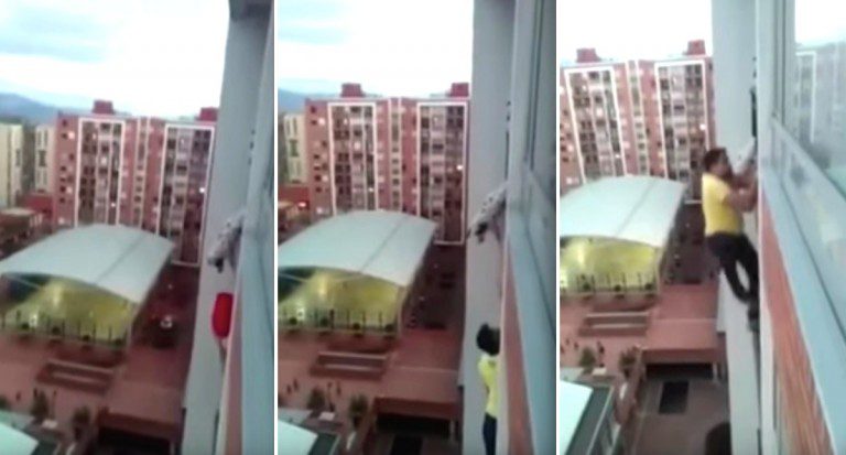 man saves dog hanging from balcony