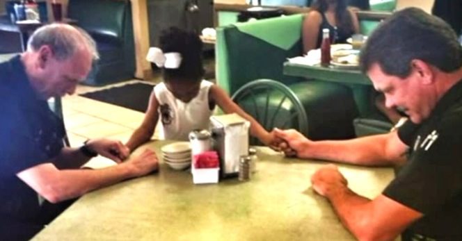 cops pray with girl
