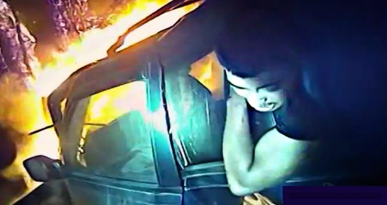 cop saves man from burning car