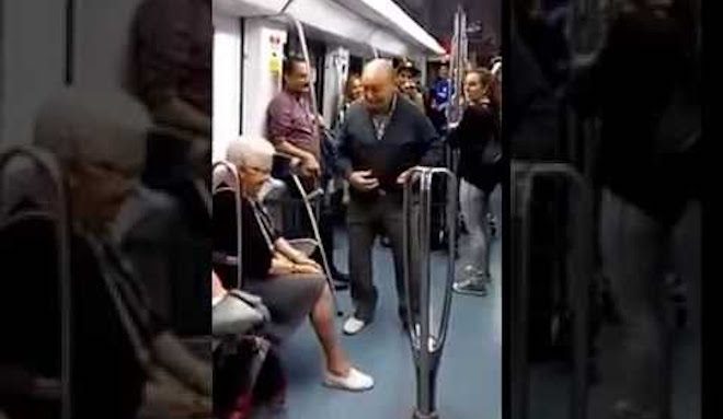 Elderly Couple On Metro Surprise Passengers With Dance Off As Rappers Sing