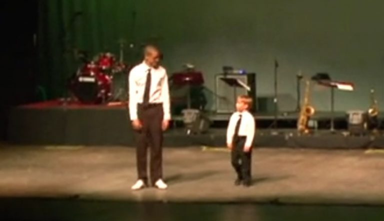 Boy And Man Tap Dance Together In Perfect Synch