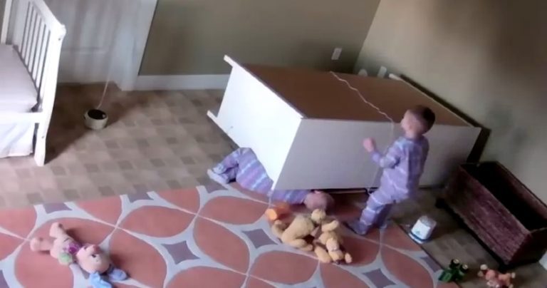 brother saves twin under dresser
