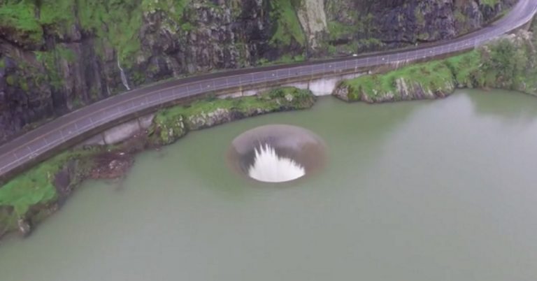 Drone Captures Footage Of Rare Spectacle Of ‘Glory Hole’ Spillway Overflowing