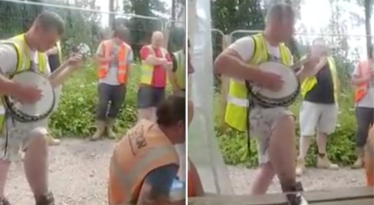 banjo player entertains coworkers
