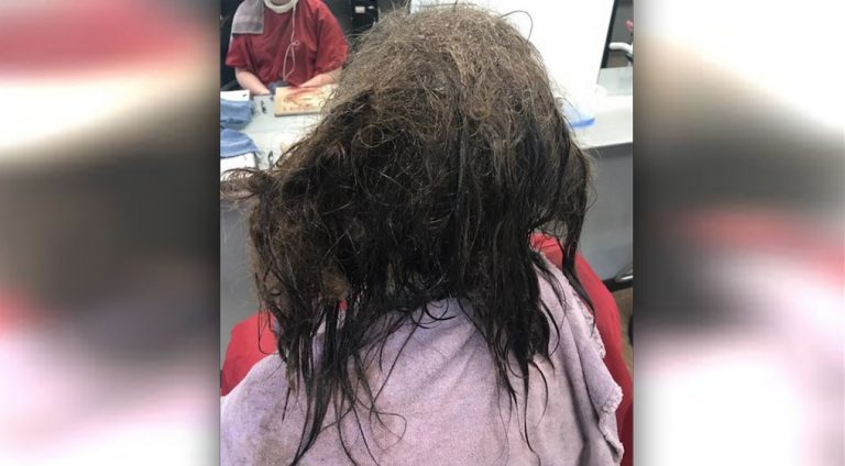 hairdresser cuts depressed teen's hair