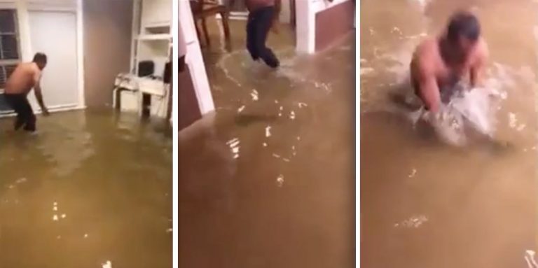Man Catches A Fish That Swims Inside His Flooded Home