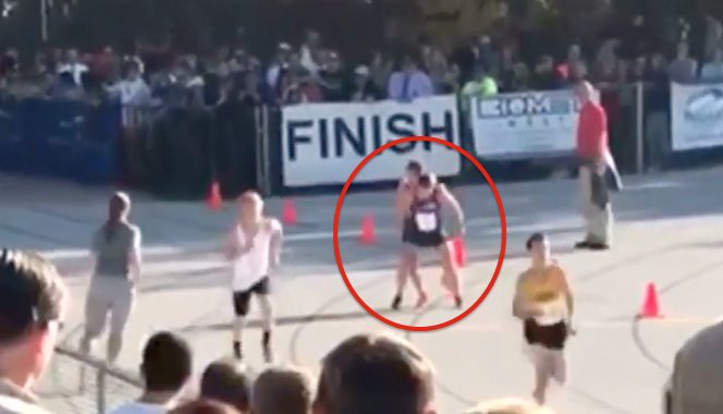 Teen Runner Breaks Leg But His Teammate Makes Sure He Finishes The Race
