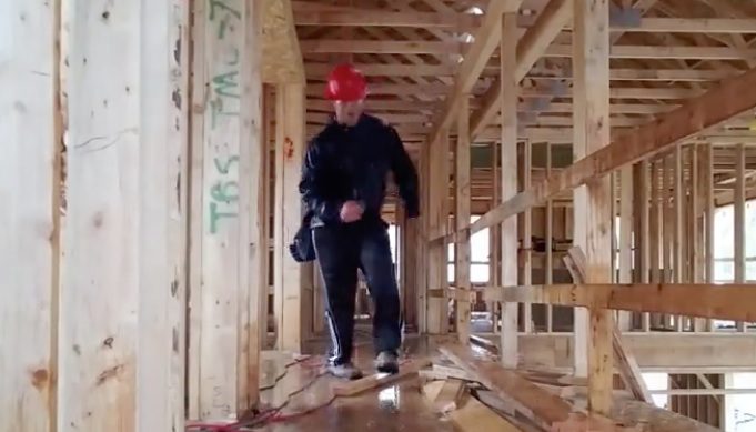 House Framer Keeps Everyone’s Spirits Up By Dancing In The Rain