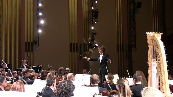 Woman Snoozing At Symphony Concert Startled Awake